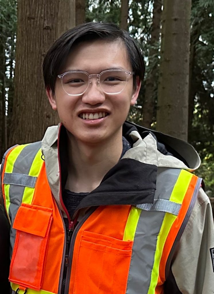 Aidan Chan in a forest during work term